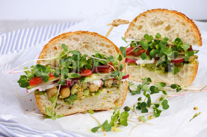 Sandwich with radish sprouts and vegetables