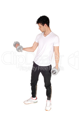 Young man exercising with two dumbbells