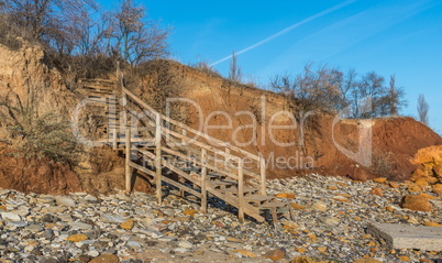 Old wooden stairs down to the sea