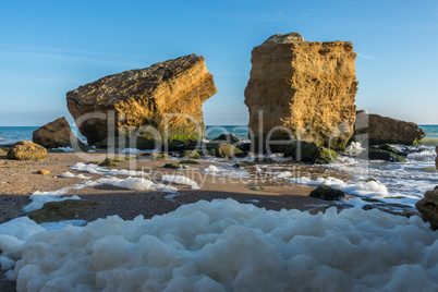 Several huge limestone stones by the sea