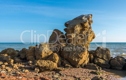 Huge stone by the sea