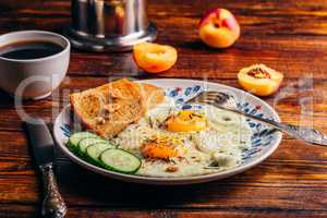Toast with fried eggs, vegetables and coffee
