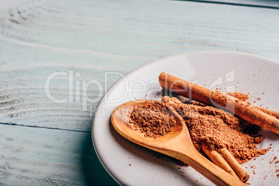 Cinnamon on white plate.