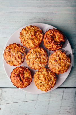 Oatmeal muffins on plate.