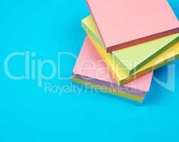 stack of multicolored empty paper square stickers