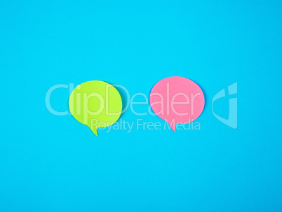 two color paper stickers on a blue background