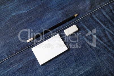 Business cards, pencil, eraser