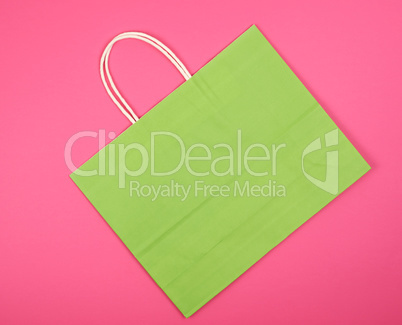 empty green paper shopping bag with a handle