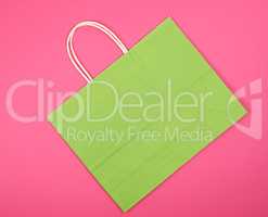 empty green paper shopping bag with a handle