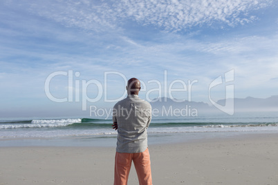 Man with gazing at the beach.