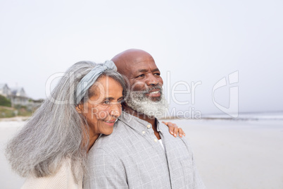 Couple smiling at the beach