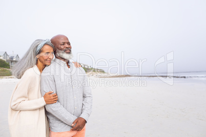 Couple smiling at the beach Couple smiling at the beach