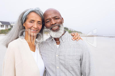 Couple smiling at the beach