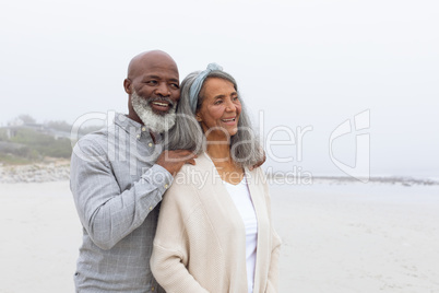 Couple smiling at the beach