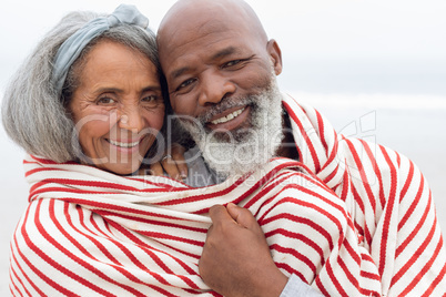 Couple smiling at the beach