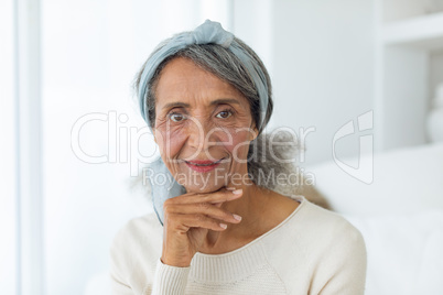 Woman smiling while sitting