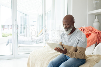 Man using digital tablet