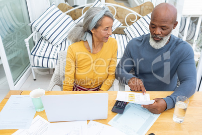 Couple calculating finances