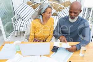 Couple calculating finances