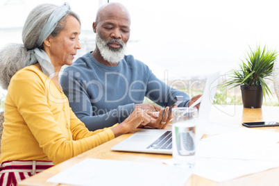 Couple calculating finances