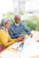 Couple calculating finances