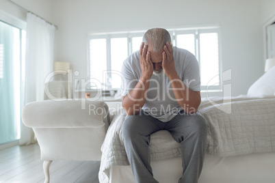 Man sitting on the bed