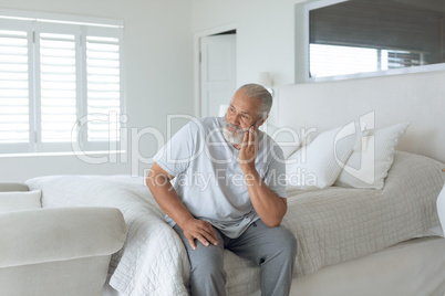 Man sitting on the bed