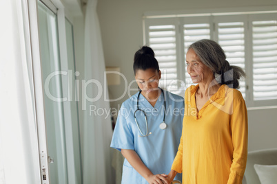 Healthcare worker and old woman