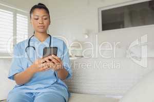 Healthcare worker using smartphone