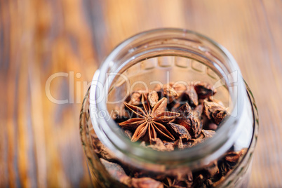 Jar of Star Anise Fruits and Seeds.