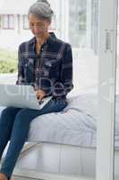 Woman using laptop