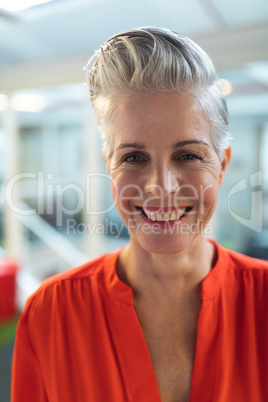 Female graphic designers smiling in office