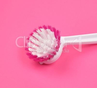 kitchen brush with white plastic handle