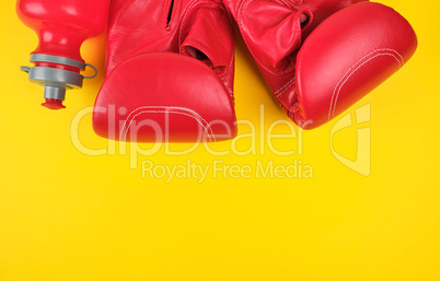 pair of red leather boxing gloves