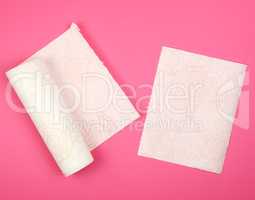 twisted roll of white soft paper napkins for face and hands