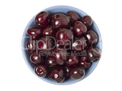 Fresh ripe cherries in bowl. Isolated on white background. Top v