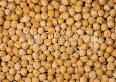 Close up of dry yellow peas background.