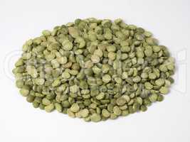 Green dry peas in a pile isolated on a white background.
