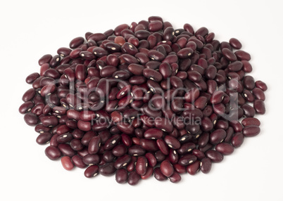 Red dry beans in a pile as background.