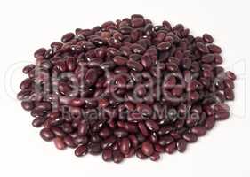 Red dry beans in a pile as background.