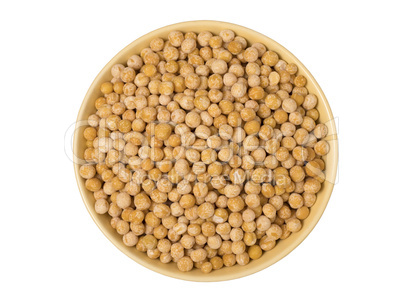 Bowl of yellow dried chickpeas on white background.