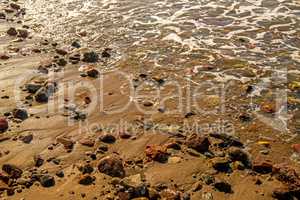 surf of the Balti sea on pebbles