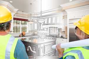 Male and Female Contractors Overlooking Kitchen Drawing