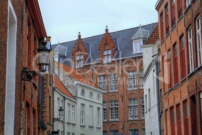 Several historical red houses in Bruges, Belgium