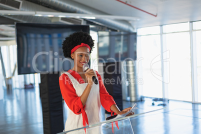 Female executive practicing her speech in the conference room