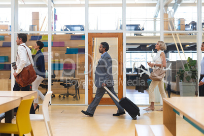 Business people walking in a modern office