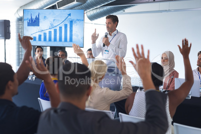 Male speaker speaks in a business seminar