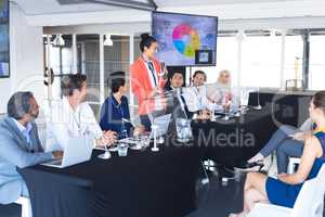 Female speaker speaks in a business seminar