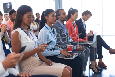 Business people attending a business seminar