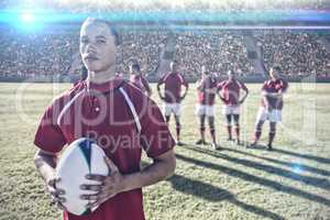 Composite image of diverse rugby players on field